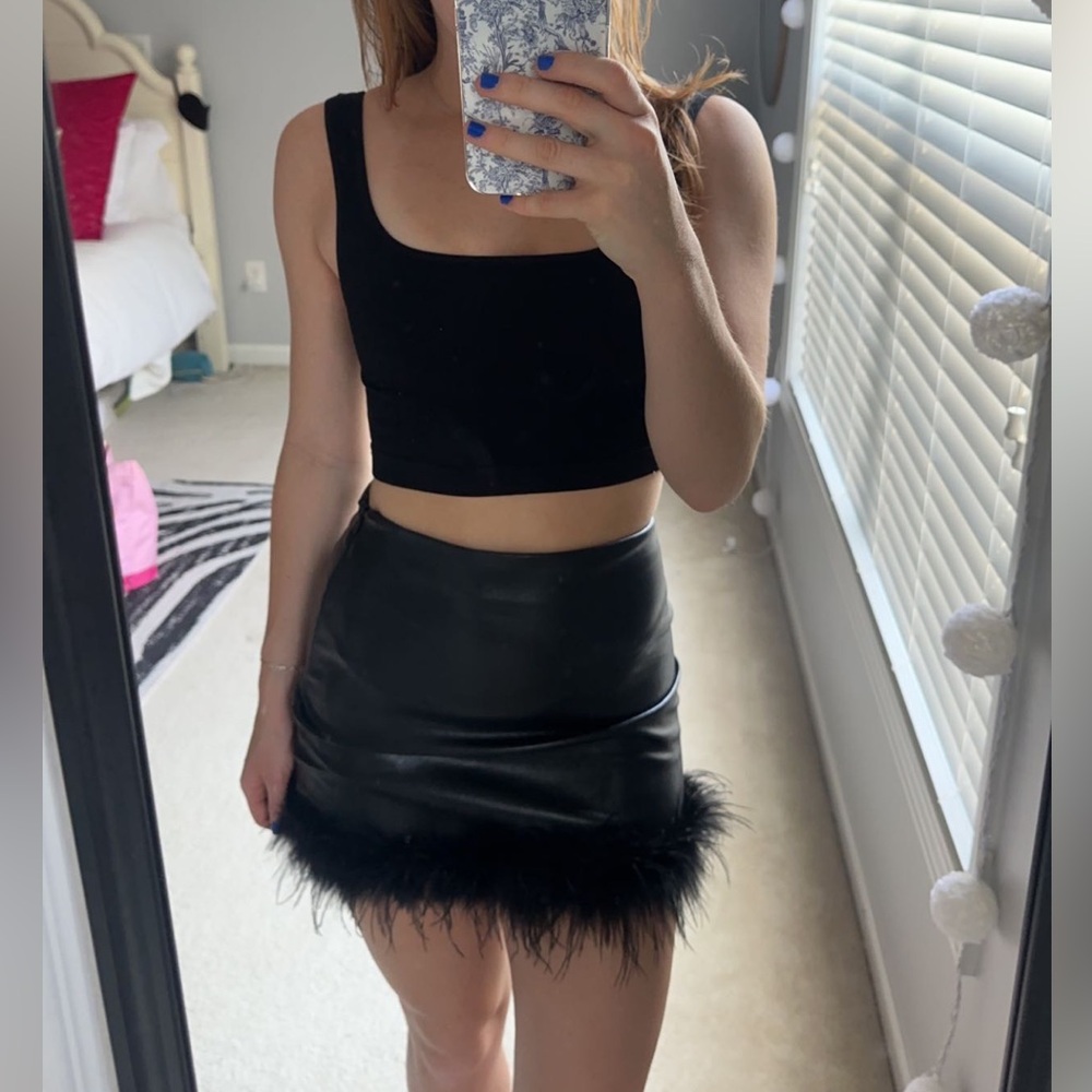 Leather + feather mini skirt